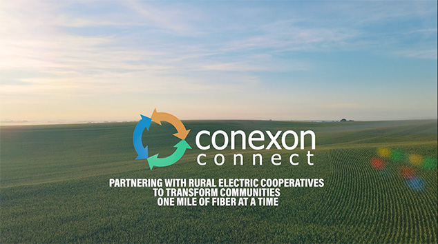 A sunrise over a corn field with the Conexon Connect logo in the center.