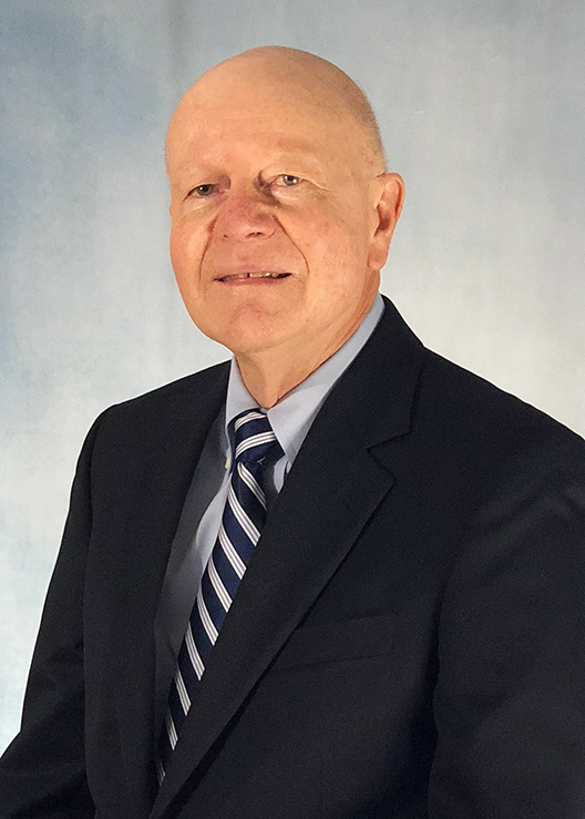 Headshot of George Weaver.