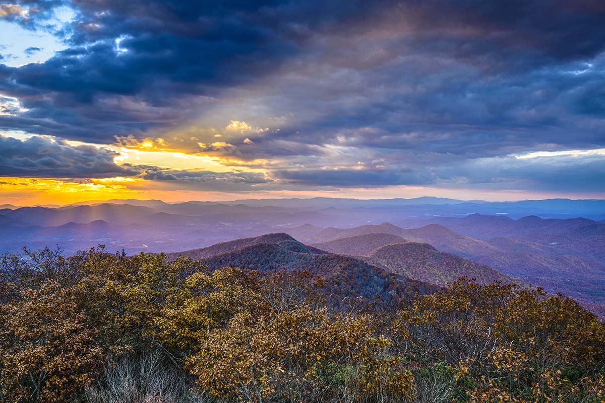 A mountain range with a cloud sunset.